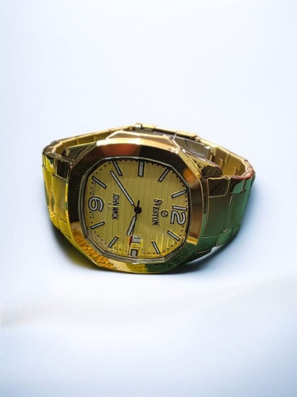 IMG-20250929-WA0037 ساعة يد ذهبية تحمل علامة "SVESTON" وتصميم "JOHN WICK 5.0" على المينا